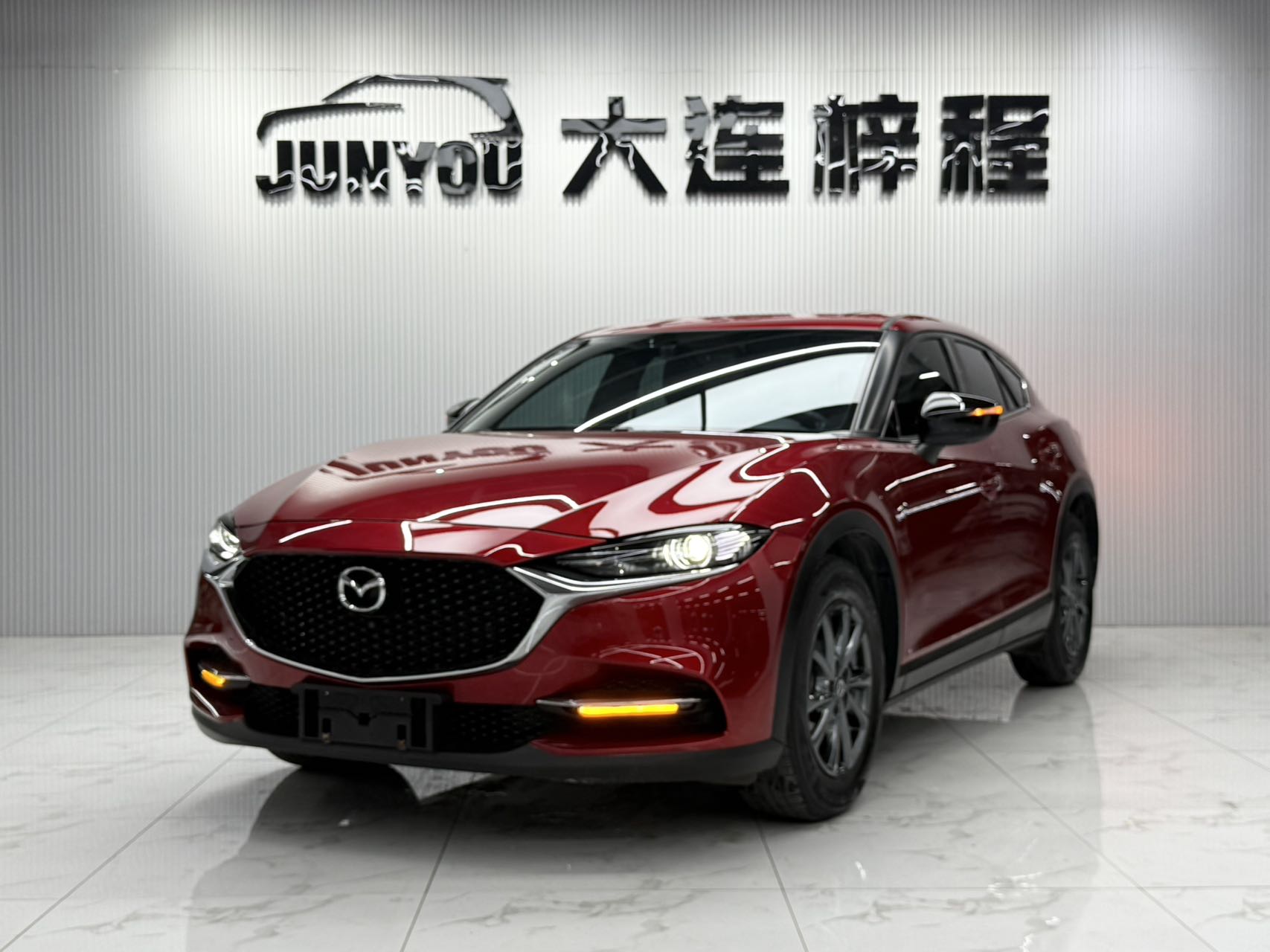 Mazda CX-4, модель 2021 года, 2.0-литровый двигатель, двухколесный привод, версия "Blue Sky Explorer"